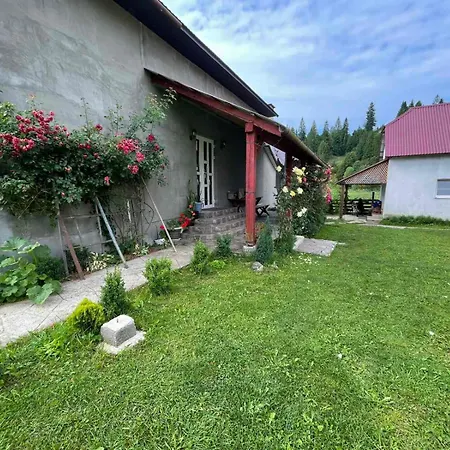 будиночок на лузі * إزكي